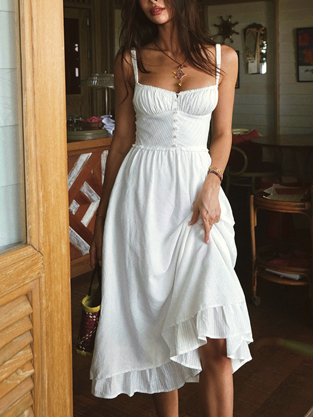 Casual women's cami midi dress with delicate ruffle hem, designed for comfortable warm weather style.