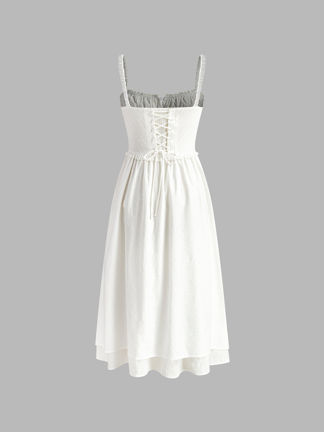 Vacation-ready women's flowing cami midi dress with a charming ruffle hem, perfect for resort wear.