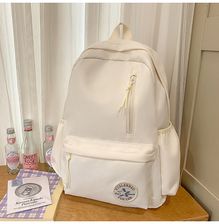 Front view of a versatile lightweight utility school backpack with multiple pockets for student daily use.