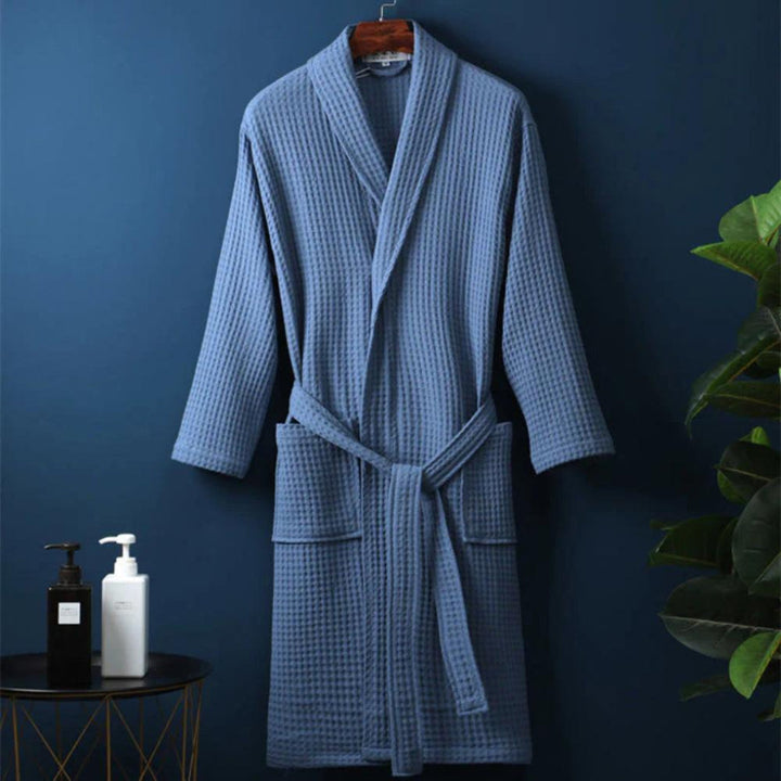 Elegant lightweight waffle cotton terry robe, comfortable unisex loungewear for relaxing at home or spa.