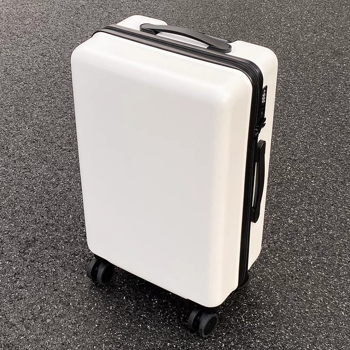 Lightweight white hard shell spinner suitcase with 360-degree wheels for easy travel.