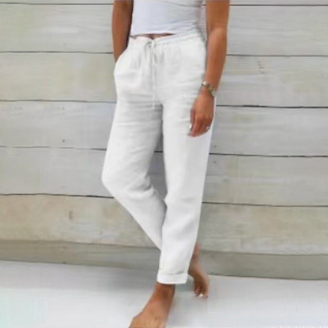 Versatile women's drawstring pants, ideal for summer, offering a relaxed fit for casual wear and vacation style.