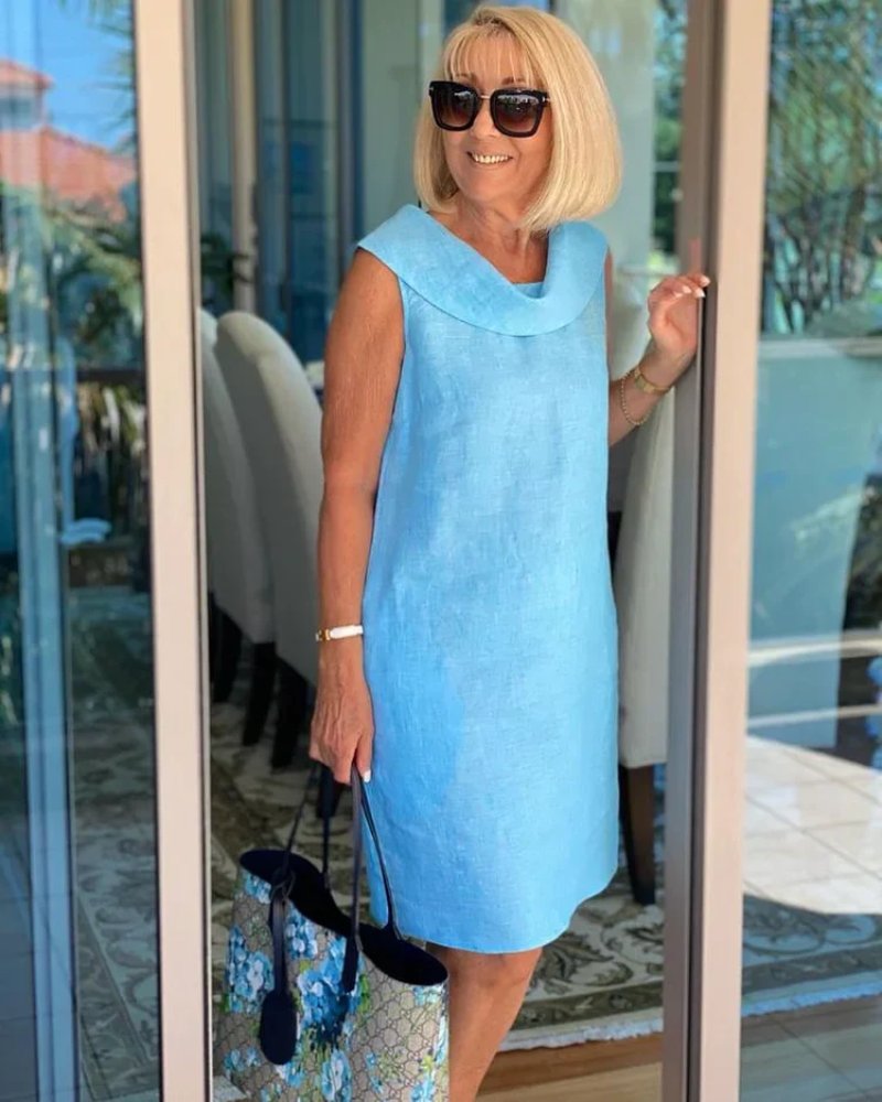 Flowy casual summer dress for women with a comfortable wide neck & sleeveless design, ideal for everyday wear.