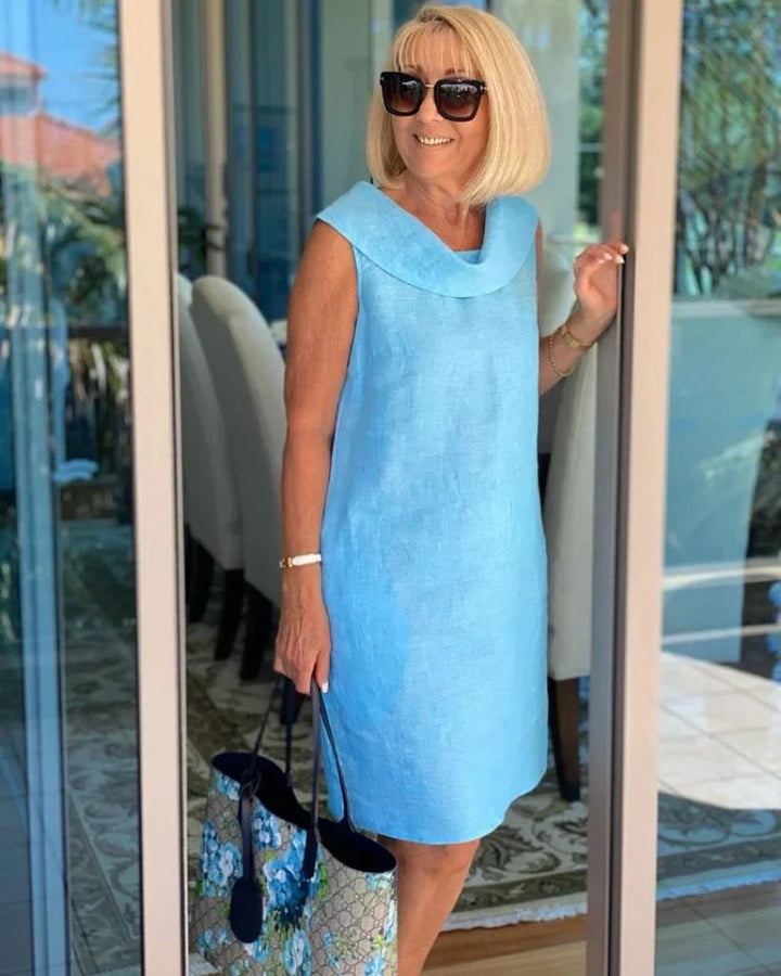 Flowy casual summer dress for women with a comfortable wide neck & sleeveless design, ideal for everyday wear.