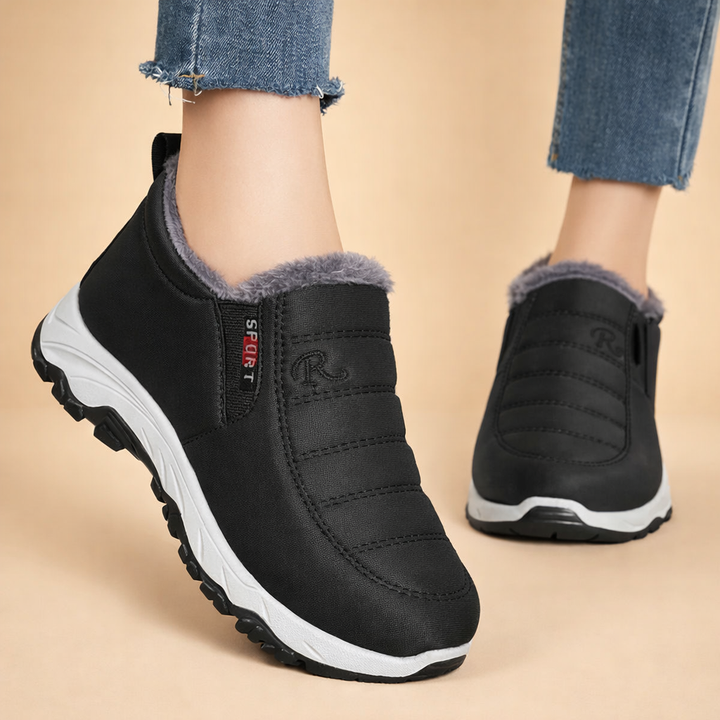 Comfortable red and black women's slip-on winter boots, ideal lightweight footwear for casual style.