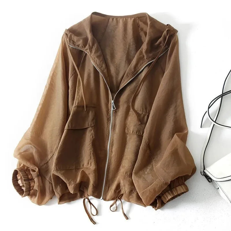Lightweight women's summer hoodie with UPF 50+ sun protection, perfect for beachwear & outdoor activities.