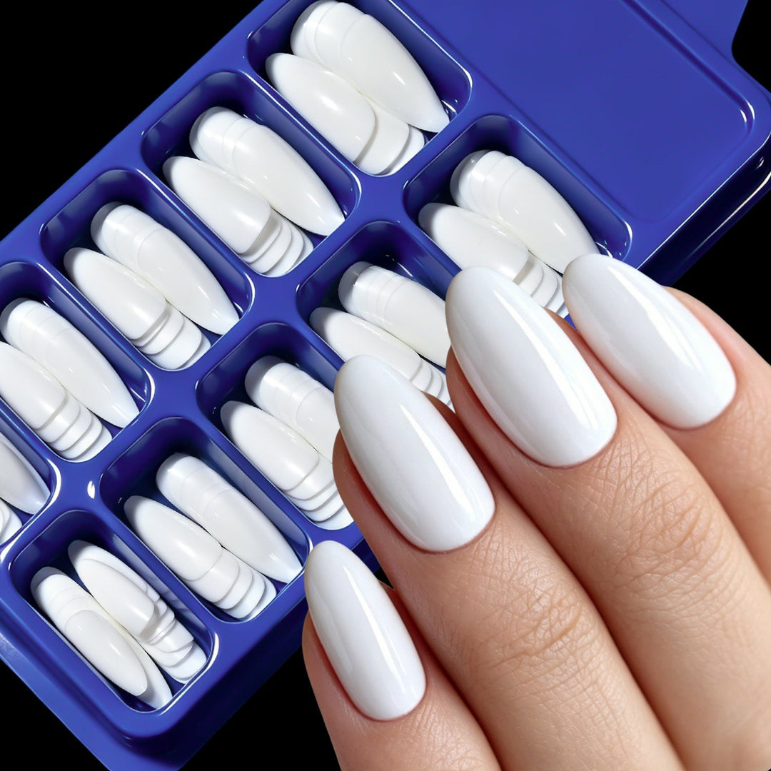Manicure kit featuring durable stiletto nail tips. Salon-quality false nails for home DIY nail art projects.
