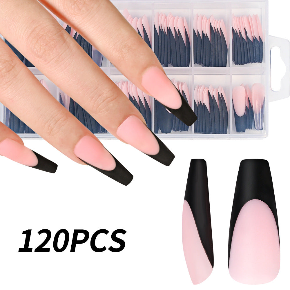 Close-up of clear long stiletto nail tips, ready for a sophisticated gel manicure, false nail extension & nail art.