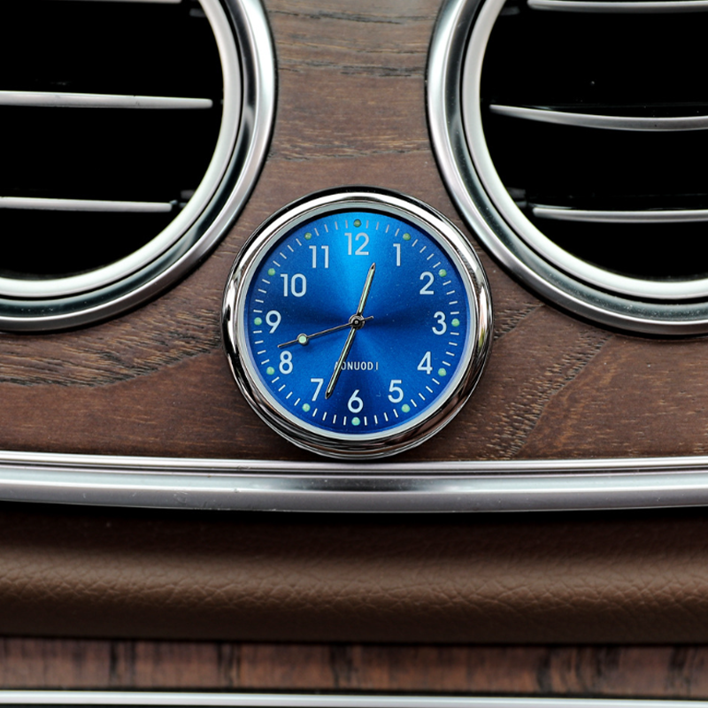 Elegant mini car clock with luminous display, perfect auto timepiece for dashboard or desk.