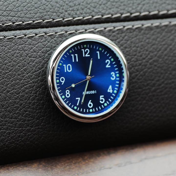 Black mini car clock with luminous digital display, an essential auto timepiece for your vehicle's dashboard.