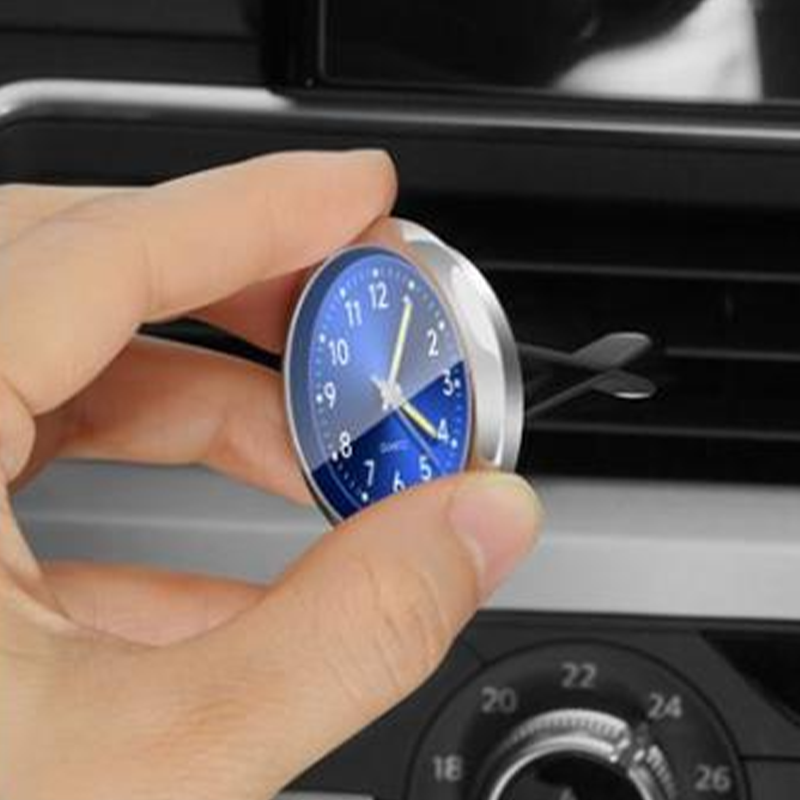 Compact luminous car clock, an accurate dashboard timepiece for enhanced driving safety day & night.