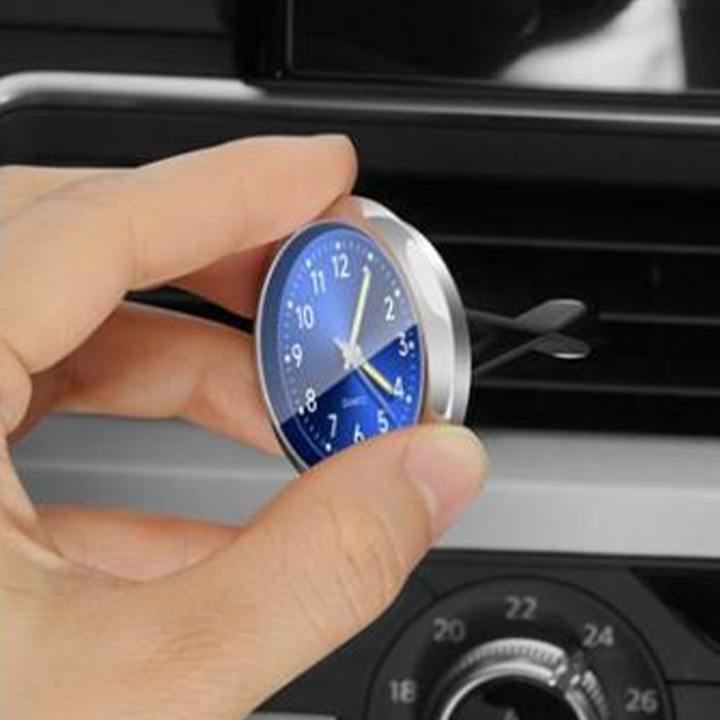 Compact luminous car clock, an accurate dashboard timepiece for enhanced driving safety day & night.
