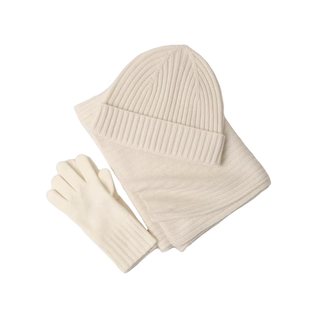 Luxurious cashmere winter set: warm gloves, hat, and scarf for ultimate comfort and style in cold weather.