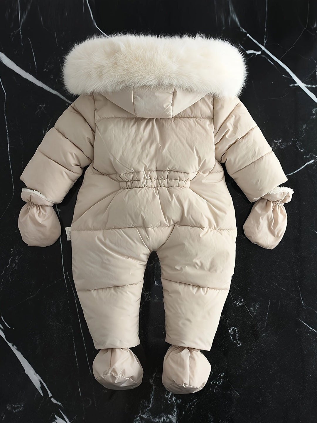 Warm baby snowsuit, hooded jumpsuit for infants playing outdoors comfortably in cold winter months.