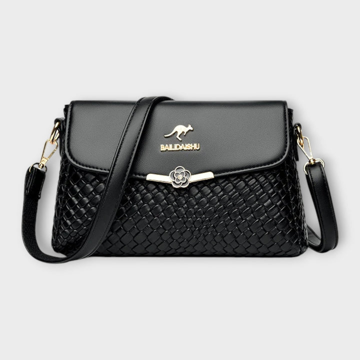 Luxurious textured women's crossbody & shoulder bag. Elegant faux leather purse, perfect for day to night chic style.