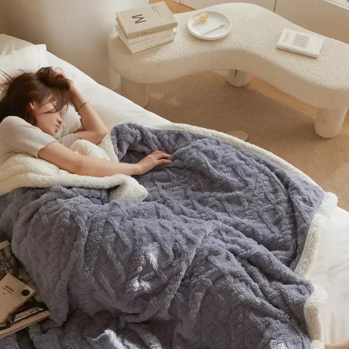 Soft, warm polyester blanket for winter. Enjoy luxurious comfort and cozy snuggles on cold nights.