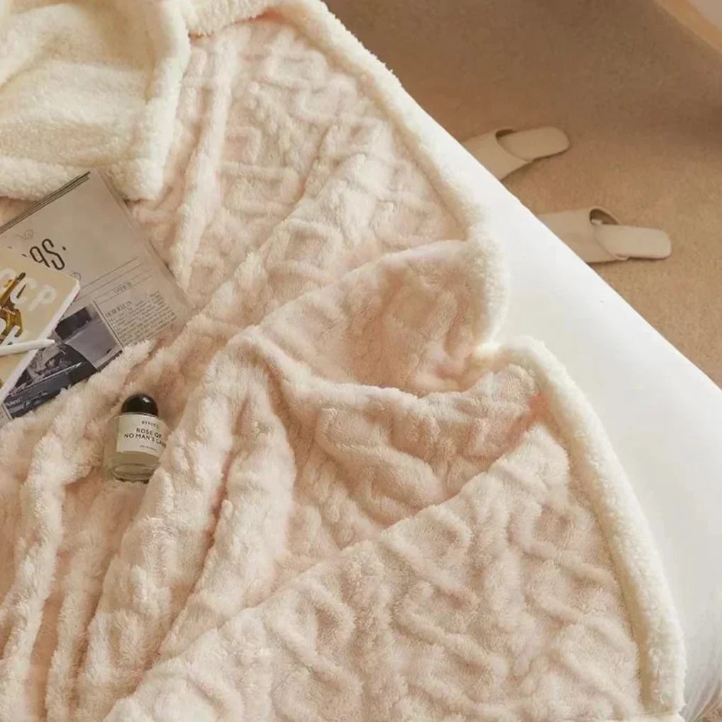 Ultimate warmth with this thick, luxurious winter blanket. A soft, insulating home essential.