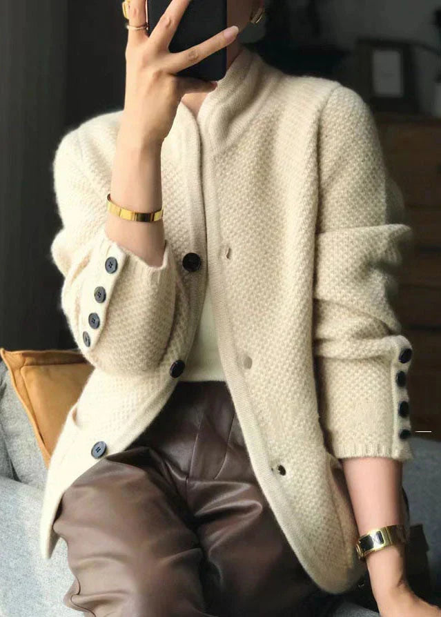 Elegant women's knitwear cardigan in warm camel hue. A versatile and comfortable layering piece.