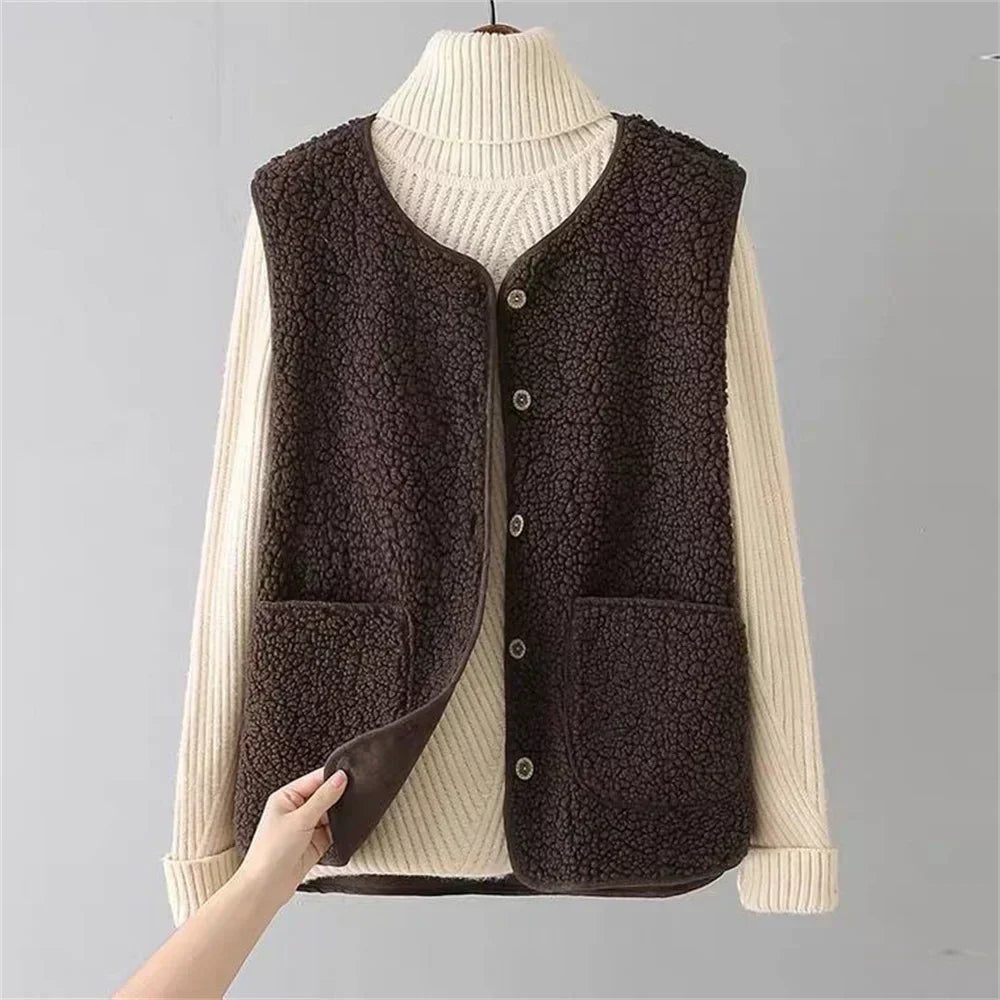 Luxurious women's fleece gilet vest, warm and soft. A stylish button-up layering piece for autumn/winter comfort.