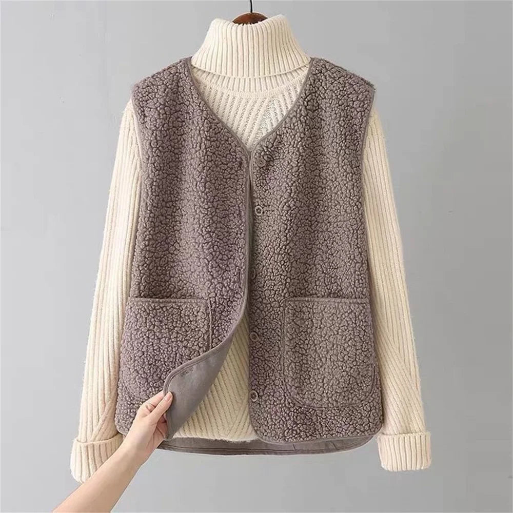 Women's luxe fleece gilet vest, offering cozy warmth and stylish comfort. Ideal for winterwear layering.