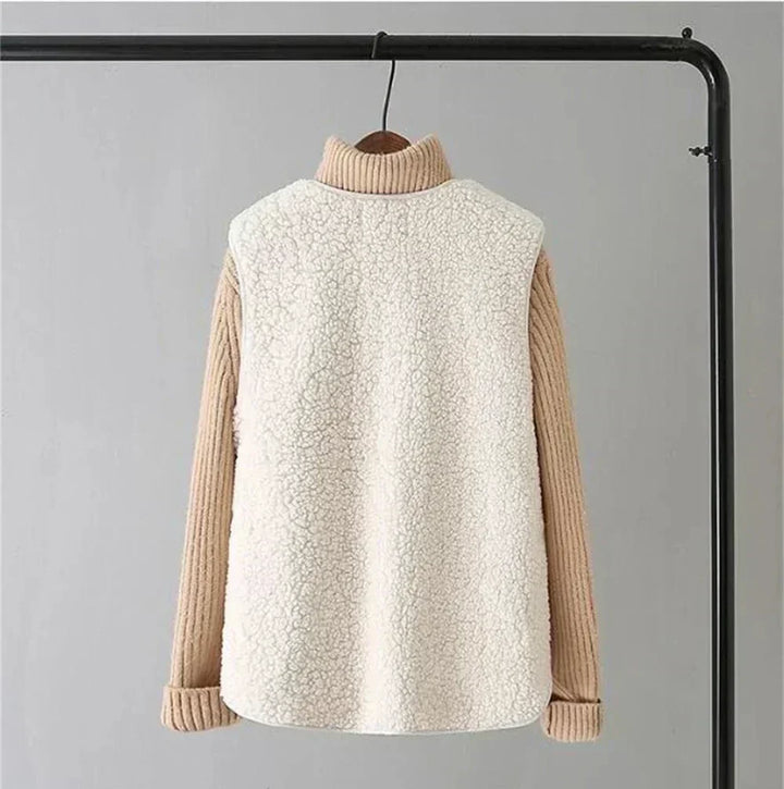 Warm women's fleece layering vest, a stylish gilet perfect for casual outerwear and seasonal comfort.
