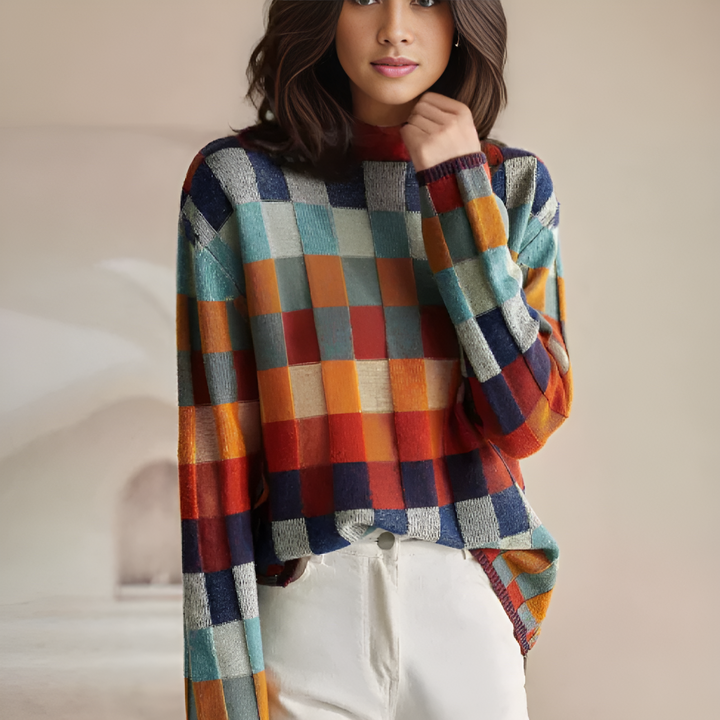 Luxurious women's high neck fine knit pullover sweater for elegant autumn/winter style. Cozy, long sleeve top.
