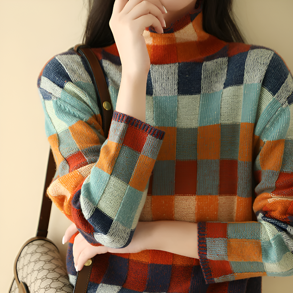 Women's relaxed fit high neck fine knit pullover. Sophisticated & warm for autumn/winter fashion.