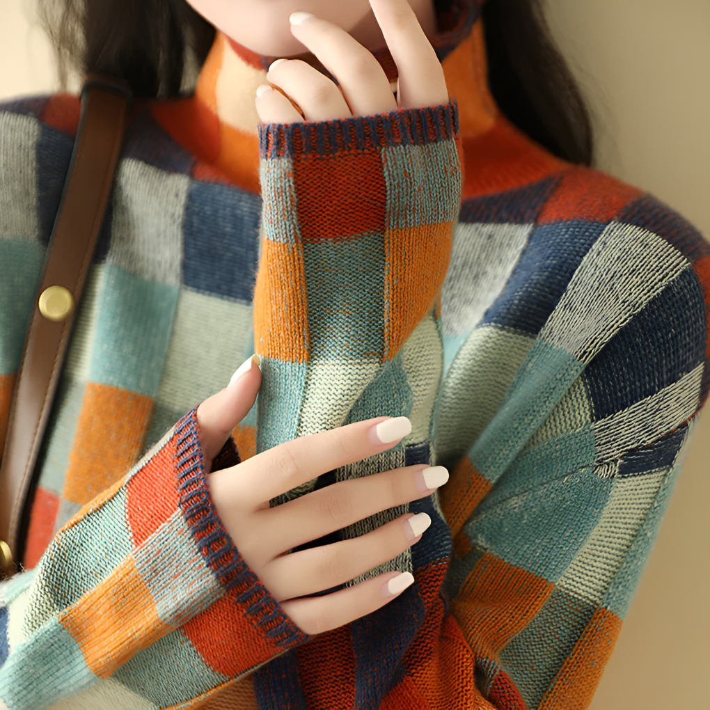 Warm women's luxurious high neck fine knit pullover sweater. Perfect for elegant autumn/winter fashion.