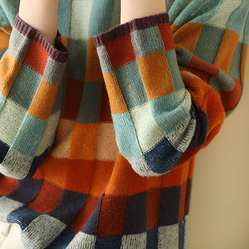 Sophisticated women's high neck fine knit pullover. Cozy, long sleeve sweater for elegant autumn comfort.