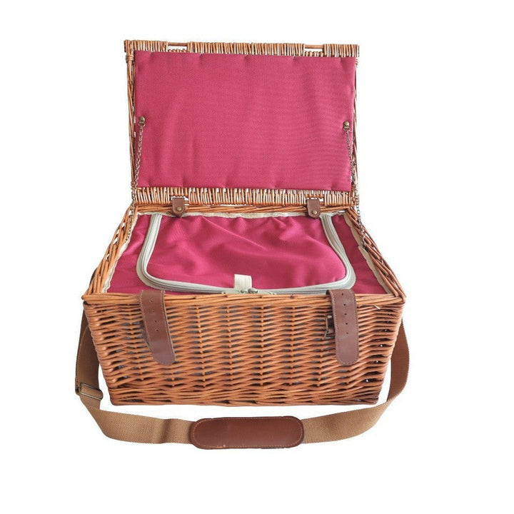 Sophisticated women's picnic basket with cooler compartment and essential crockery for memorable outdoor adventures.