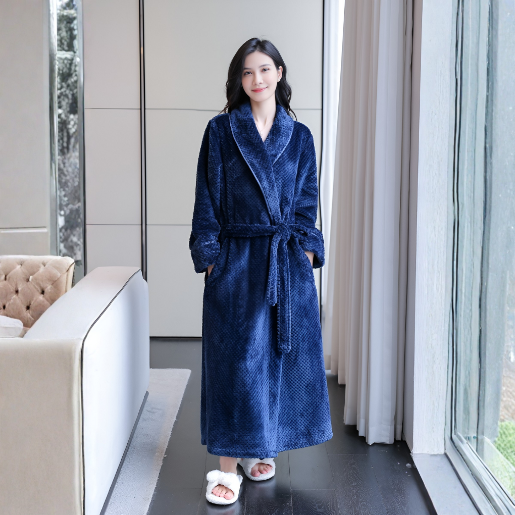 Comfortable women's plush hooded loungewear robe, an ultra-soft polyester fleece wrap perfect for relaxation.