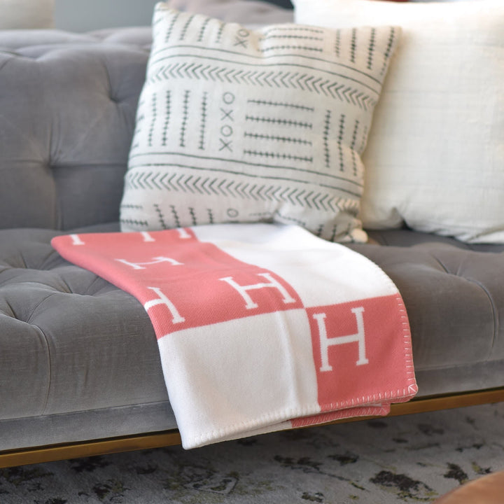 Stylish wool-cashmere blanket, a luxurious and warm addition to any living space.