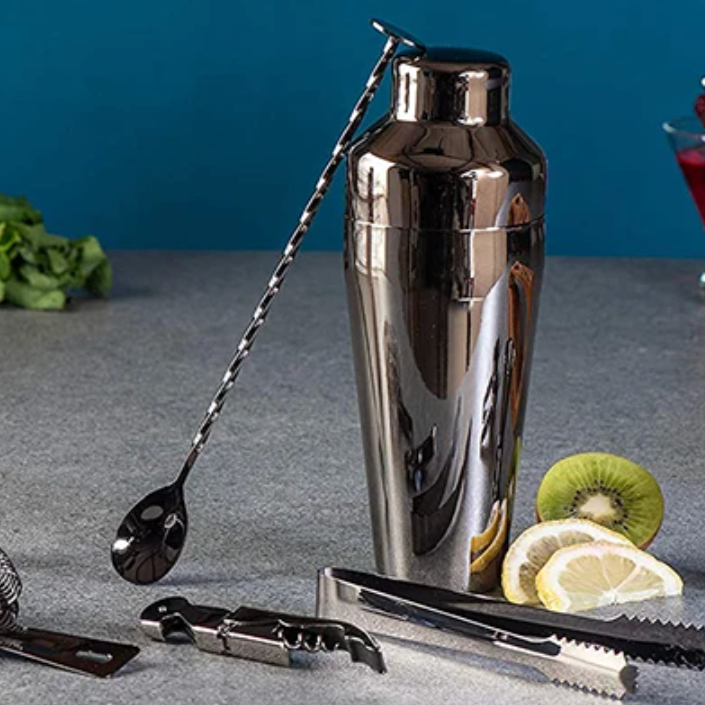 Shiny stainless steel cocktail shaker & bar tools. Deluxe 10-piece mixology set for expert drink crafting.