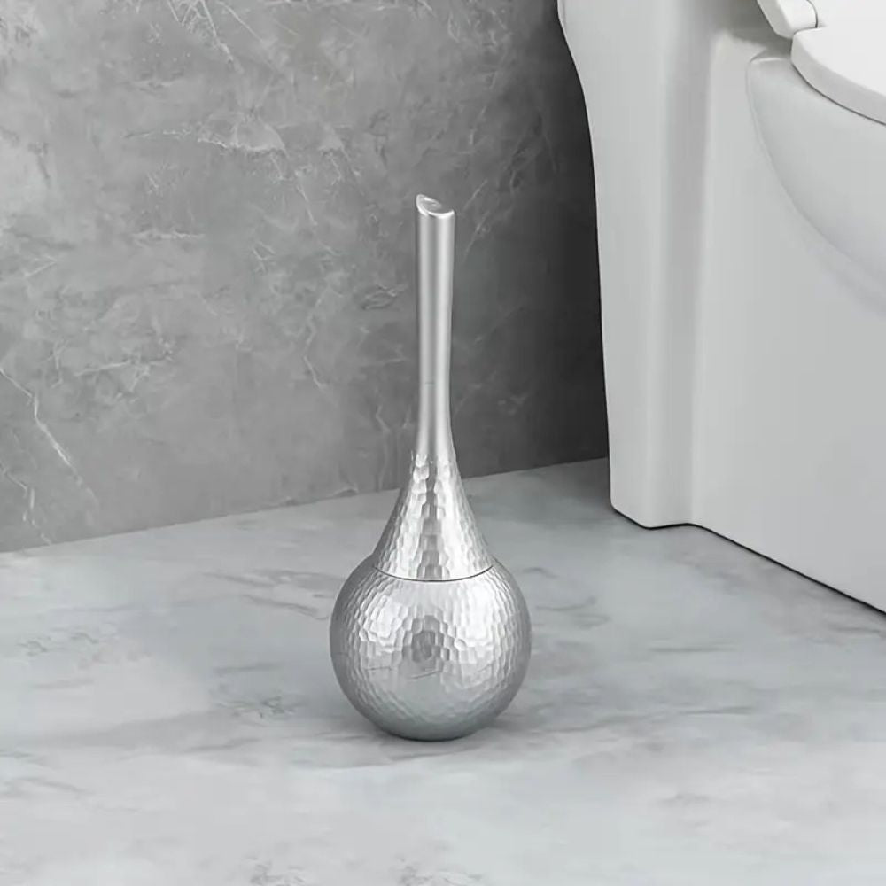 Elegant ivory pearl toilet brush with holder. Durable design for luxury bathroom cleaning & hygiene.