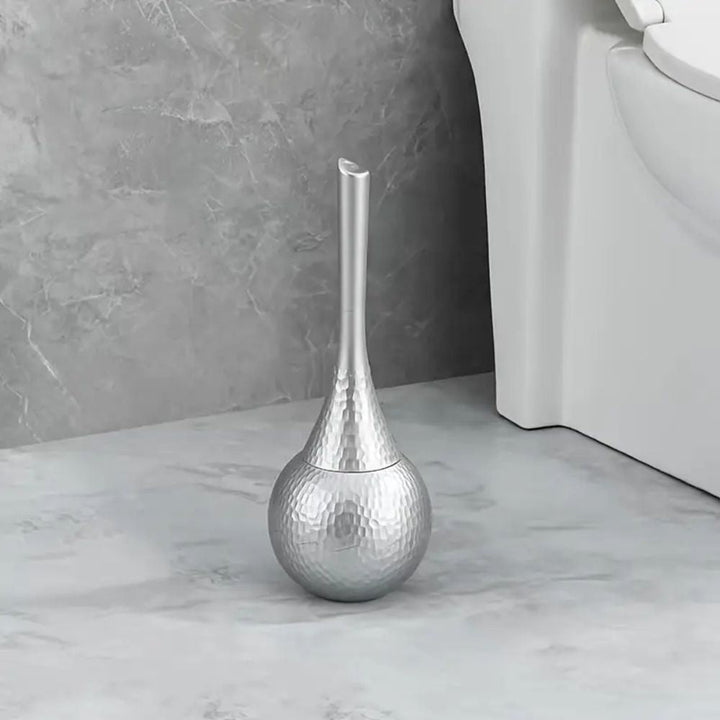 Elegant ivory pearl toilet brush with holder. Durable design for luxury bathroom cleaning & hygiene.
