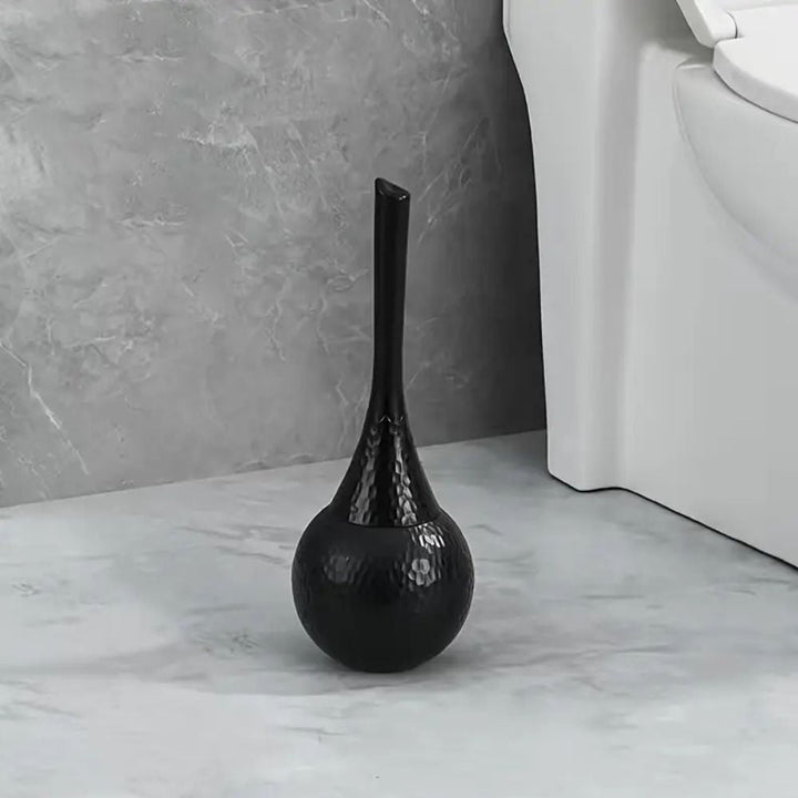 Premium golden elegance toilet brush with holder. Discreet & durable for modern bathroom cleaning.