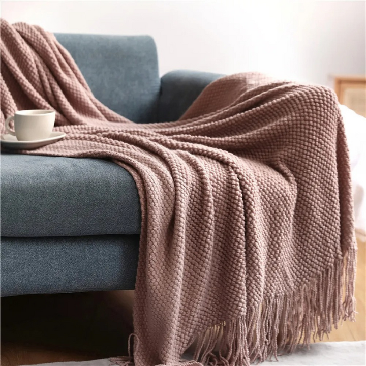 Luxury merino-style throw with tassels, soft acrylic blanket perfect for cozy living room or bedroom decor.