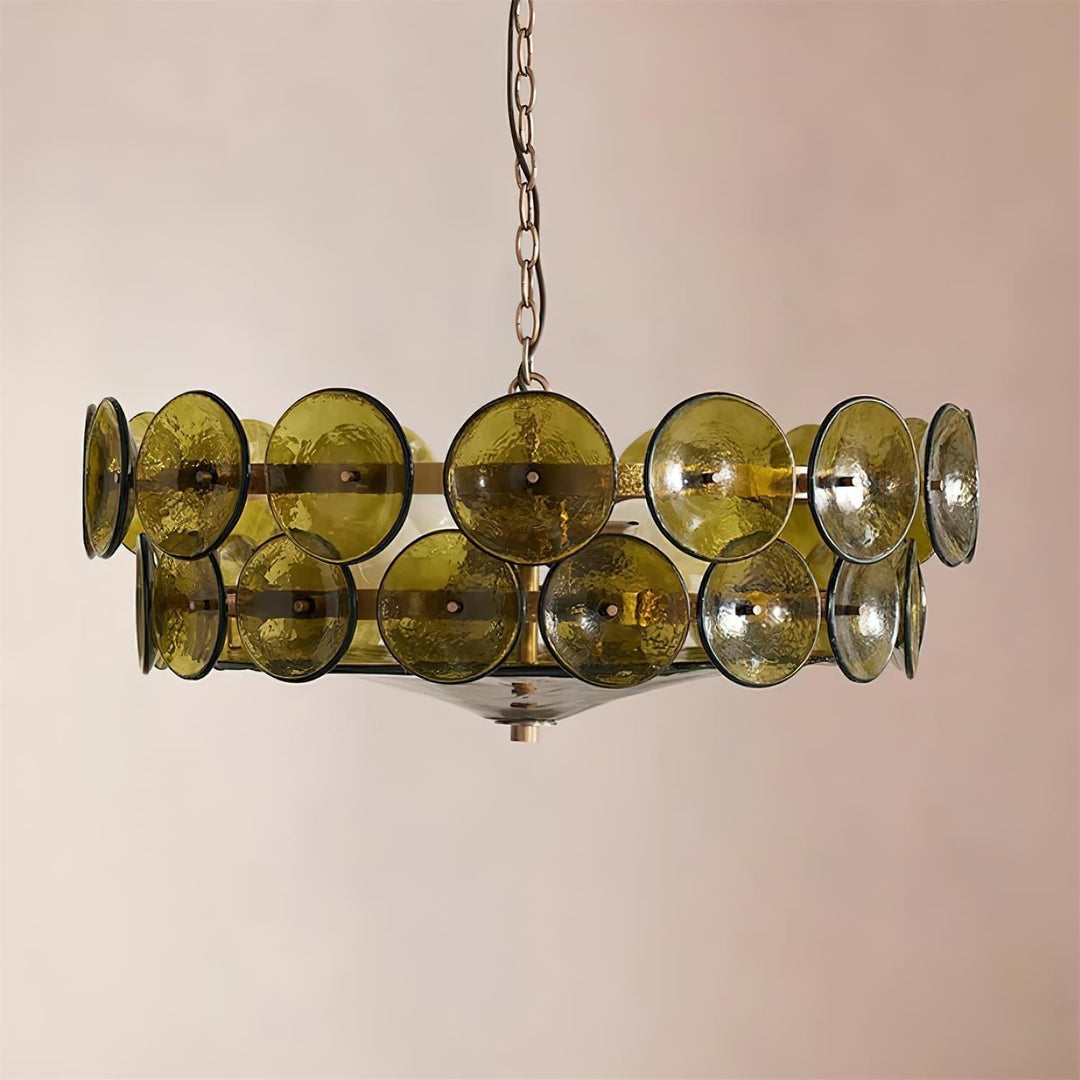 Ornate round metal & glass chandelier, modern luxury for sophisticated homes.