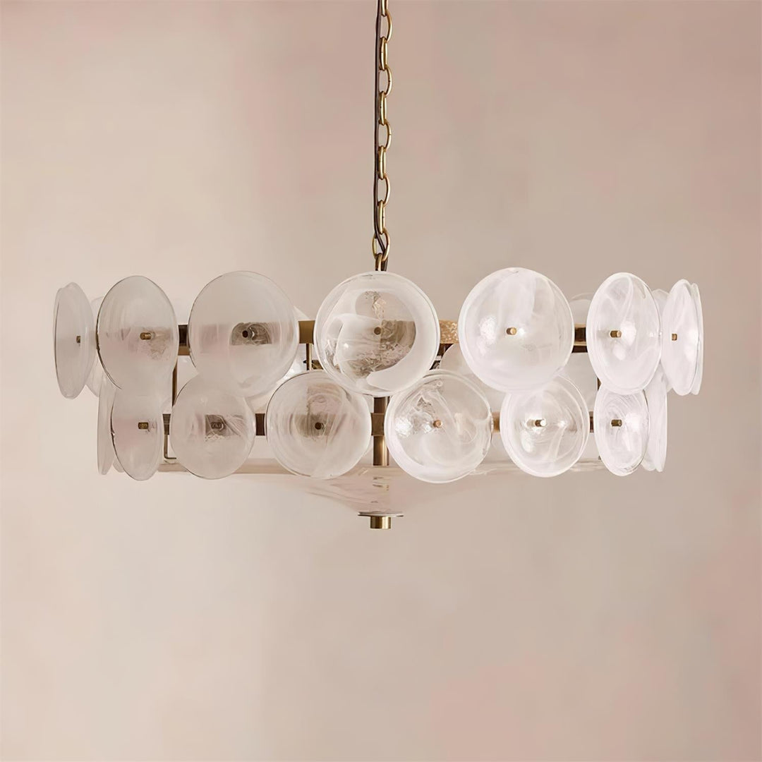 Luxury round chandelier featuring multi-colored glass accents (orange, green, white).