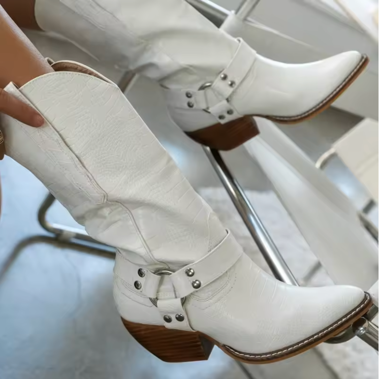 Chic women's Western fashion boots, pointed toe design, ideal for a bold cowgirl style statement.