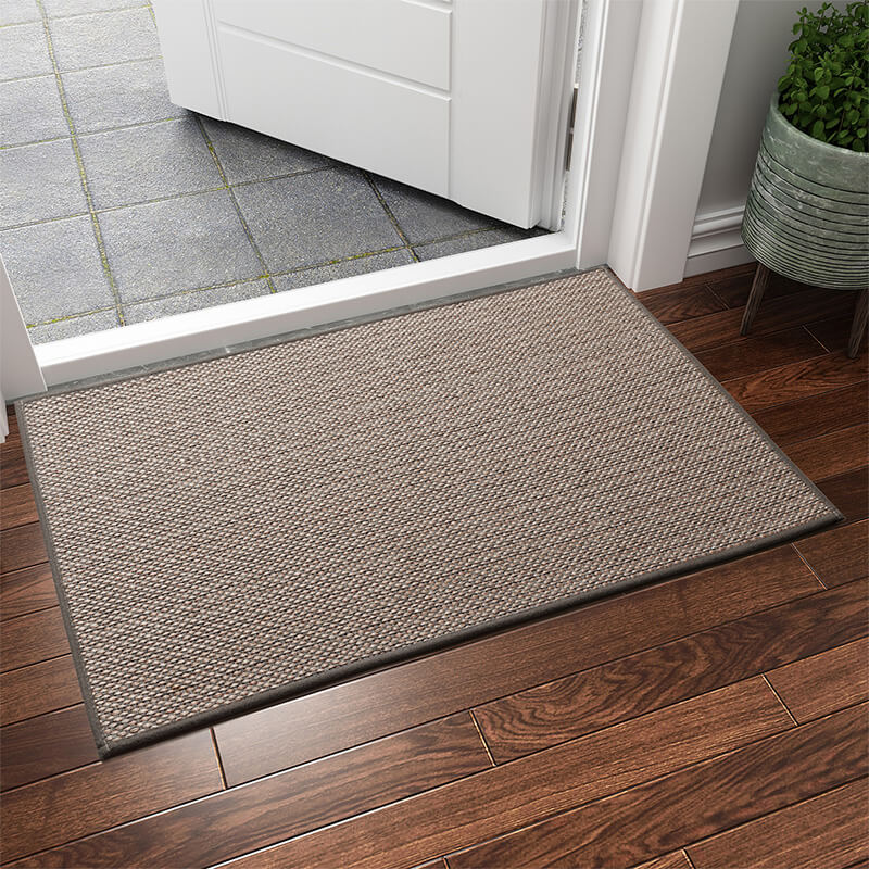 Effortless cleaning with this machine washable indoor door mat. Durable woven non-slip entryway floor mat.