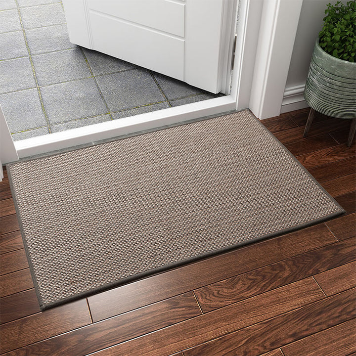Effortless cleaning with this machine washable indoor door mat. Durable woven non-slip entryway floor mat.