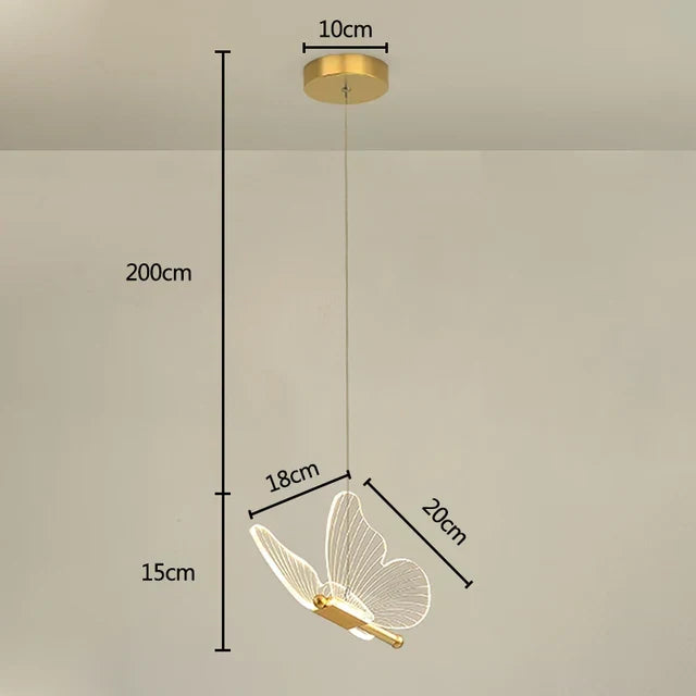 Modern LED butterfly pendant light, a magical glass and metal ceiling fixture for children's bedrooms.