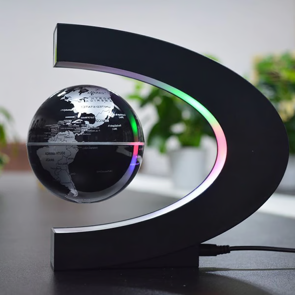 Dynamic LED light-up magnetic floating globe, a captivating science decor piece for any desk or shelf.