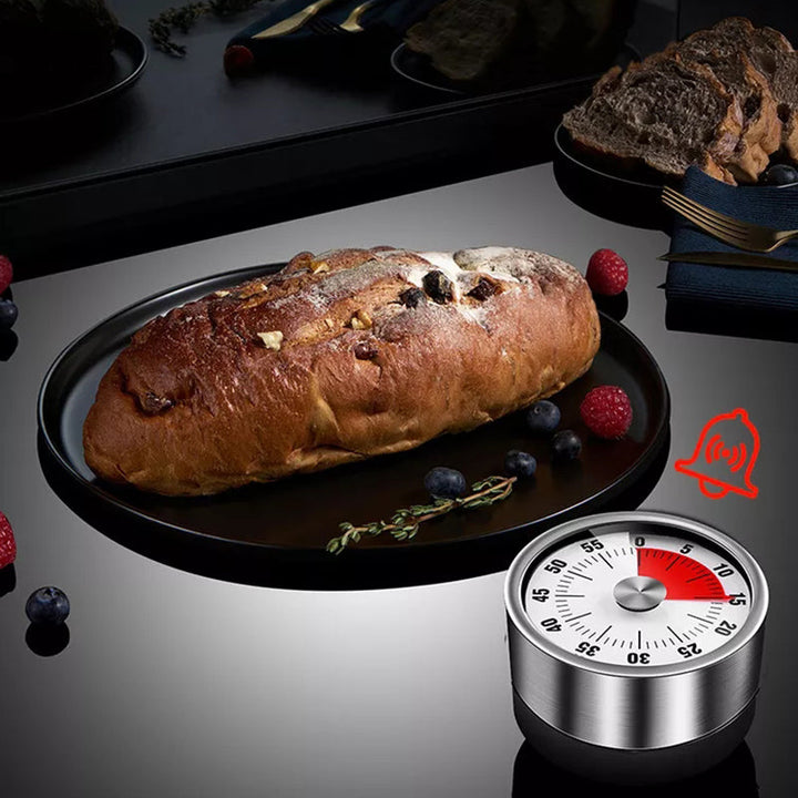 Stylish vintage magnetic kitchen timer. Mechanical, no battery. Enhances kitchen decor & productivity.