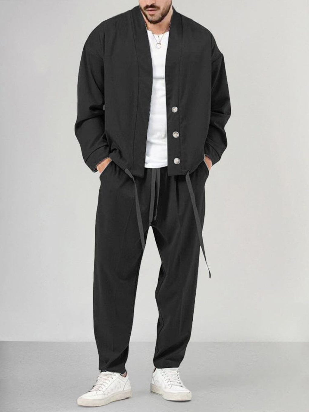Stylish men's relaxed fit two-piece knit lounge set, a versatile casual track suit for modern comfort and style.