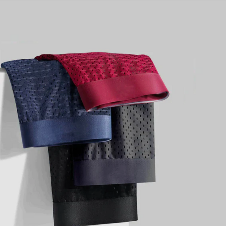 Full view of a single men's ultra-comfort boxer brief, grey. Breathable, flexible everyday underwear for daily wear.
