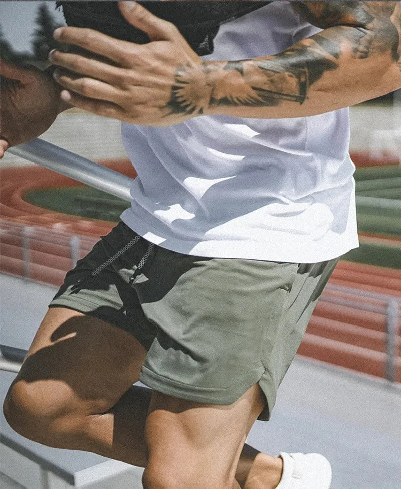 Gym workout shorts for men, 2-in-1 with performance fabric & compression liner. Max comfort.