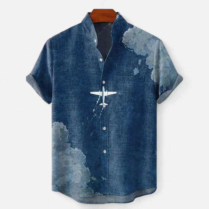 Modern men's button-up short sleeve shirt with an eye-catching artistic print, summer fashion essential.
