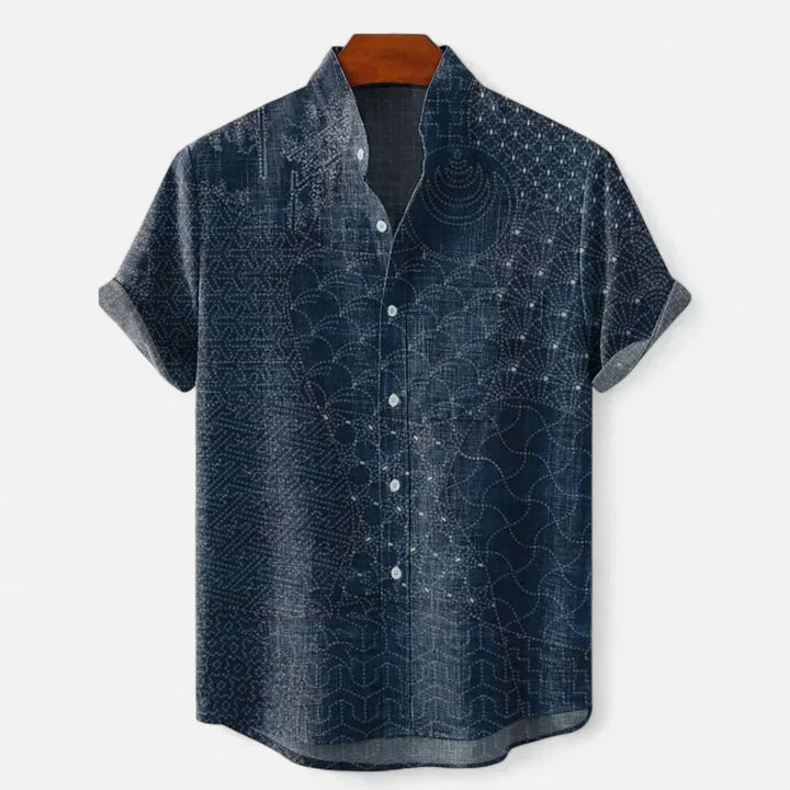 Lightweight men's short sleeve shirt with artistic print, designed for casual summer and resort wear.